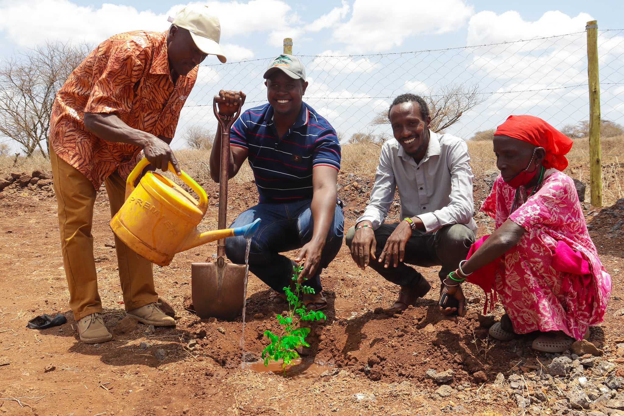 Community members working together on sustainable farming